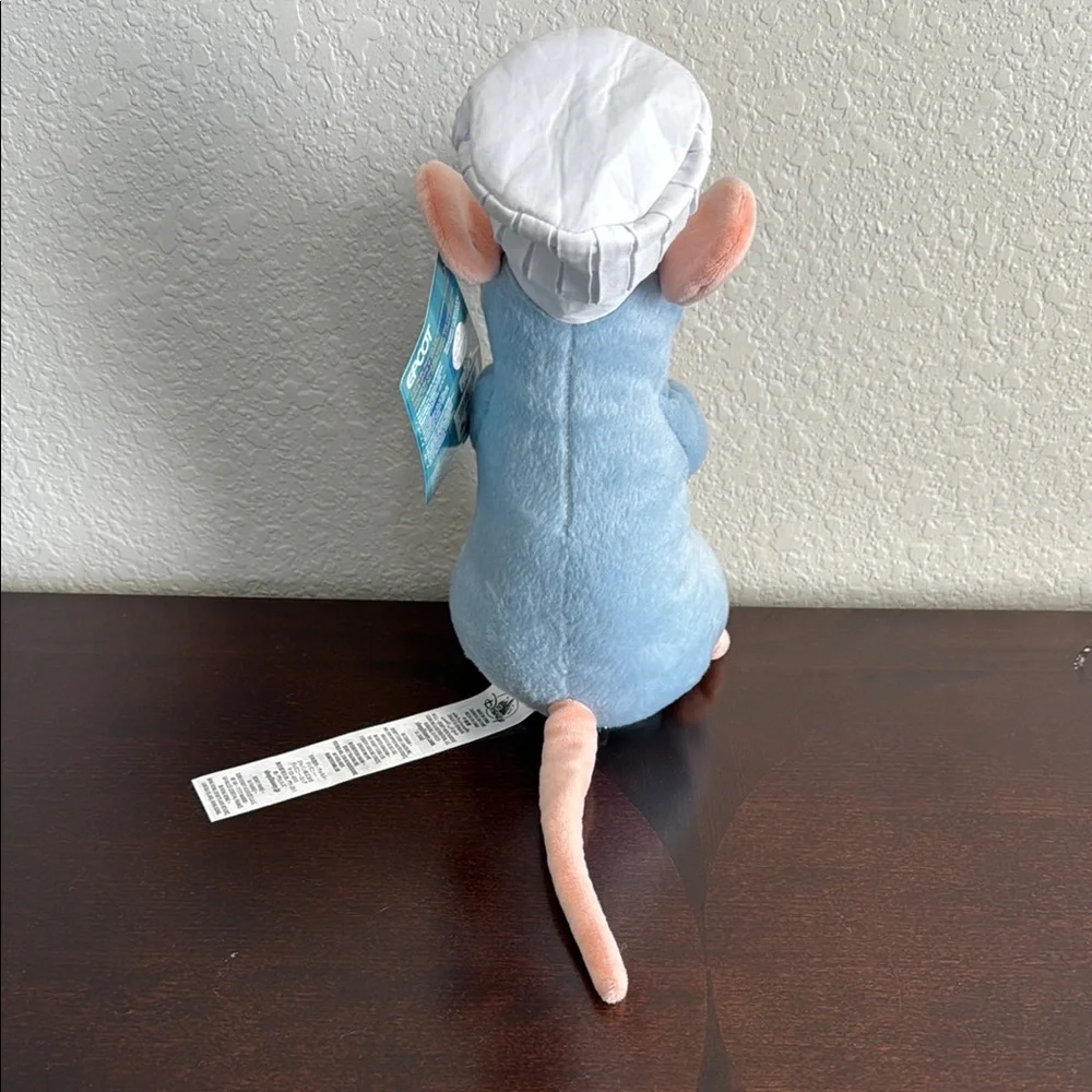 Disney Light Blue and Peach Ratatouille Plush Remy speaks English and French - Picture 4 of 8